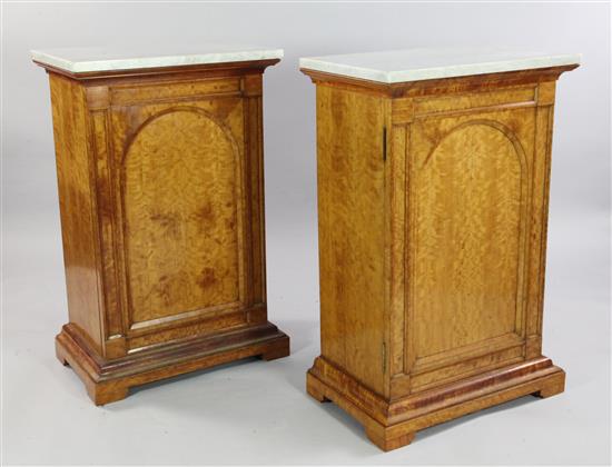 Royal Furniture: A pair of Victorian marble top satinwood cabinets, ex-Frogmore House, W.2ft